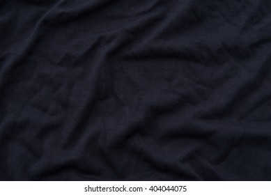 Close Up Of Beautiful Wrinkle Black Fabric Texture.