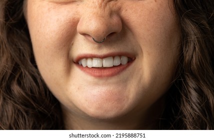 Close Up Of Beautiful Young Woman Turning Up Her Nose, With Nose Ring