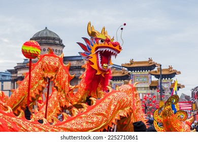 Close up of the beautifully decorated dragon performing its traditional Chinese New Year dragon dance in Liverpool seen in January 2023.