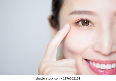 close up of beauty woman pointing her eye - Shutterstock ID 1196832181