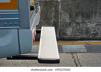 Close Up Bed Steps At The Back Of Truck On The Street.               