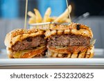 Close up of beef hamburger on restaurant table.