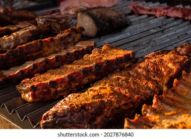 Close Up Of Beef Or Pork Ribs Roasted On American Style Grill.