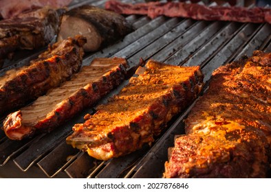 Close Up Of Beef Or Pork Ribs Roasted On American Style Grill.