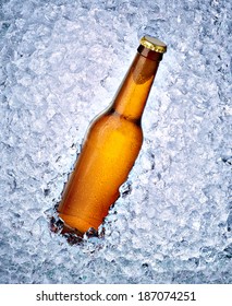 Close Up Of A Beer Bottle In Ice