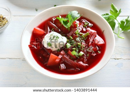 Similar – Image, Stock Photo Tasty beetroot soup borscht. Top view, flat lay