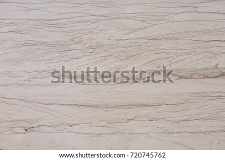Close up of beige quartzite stone texture. High resolution photo.