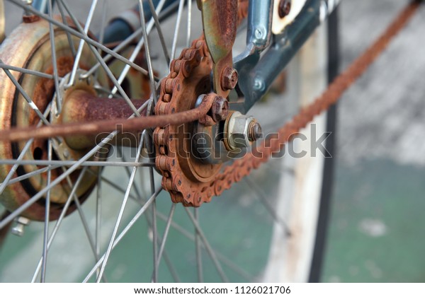 Close up Bicycle Part with Old Cassette Gear is\
rusty. Bicycle Gear is\
rusty.