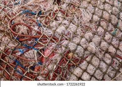 Close Up Of Big Piles Of Trawler Fishing Nets In Morocco. 