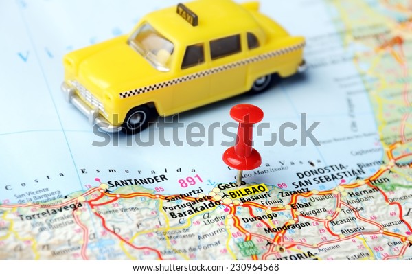 Close up of Bilbao  ,Spain  map taxi  and red pin\
- Travel concept
