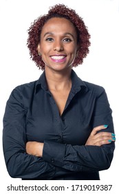 
Close Up Of Black And Brazilian Business Woman Posing For Portraits On White Background