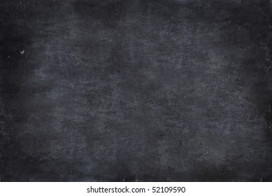 close up of a black dirty chalkboard