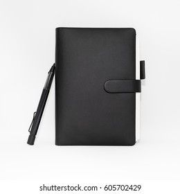 Close Up Black Leather Book With Pencil