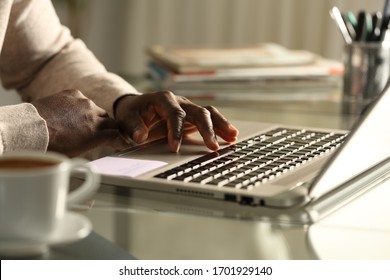 Close Up Of Black Man Hand Using Touchpad On Laptop On A Desk At Night