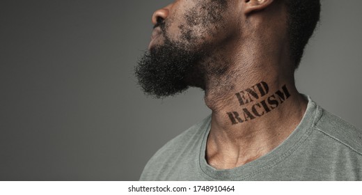 Close Up Black Man Tired Of Racial Discrimination Has Tattooed Slogan End Racism On His Neck. Concept Of Human Rights, Equality, Justice, Problem Of Violence And Racism, Discrimination. Flyer.