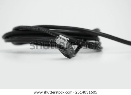close up of black network cable. Twisted-pair cable