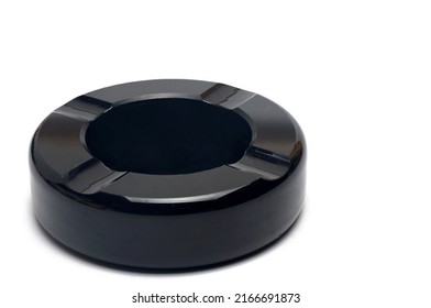 Close Up Of Black Old Retro Vintage Elegant Round Bakelite Ashtray With Four Cigarette Rests On Background