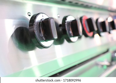 Close up black switch of Kitchen burning gas cooker ; knob