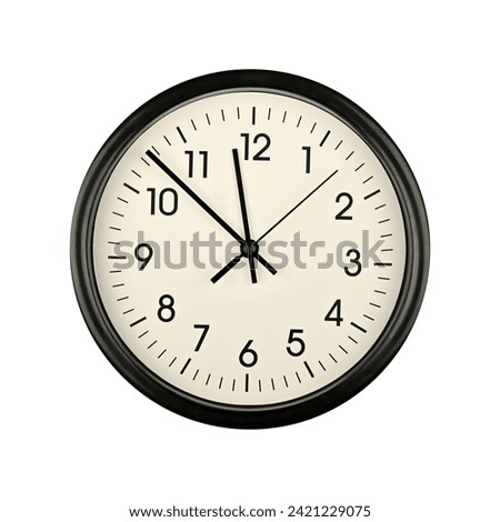 Close up black wall clock face dial with Arabic numerals, hour, minute and second hands isolated on white background