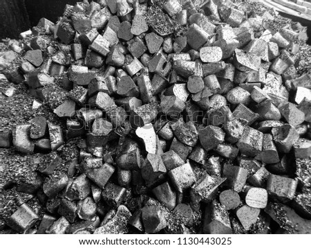 Close up black and white  aluminum alloys, The fraction of aluminum or metal or ore that is a heap is on the stock for melting or using other in the job industry