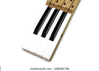 Close Up Black And White Key Sticks Of Piano In Set Of Triplets.