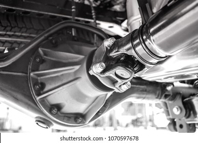 Close up of the black and white  pickup truck drive shaft - Shutterstock ID 1070597678