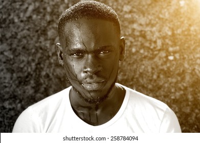 Close Up Black And White Portrait Of An African American Man Dripping With Sweat