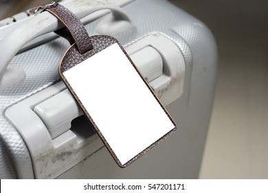 Close Up Of Blank Leather Luggage Tag Label On Oid Suitcase Or Bag With TRAVEL INSURANCE ,Can Be Used For Montage Or Display Your Products,selective Focus,vintage Color