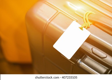 Close Up Of Blank Luggage Tag Label On Suitcase Or Bag With TRAVEL INSURANCE ,Can Be Used For Montage Or Display Your Products,selective Focus,vintage Color