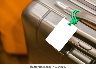 Close Up Of Blank Luggage Tag Label On Suitcase Or Bag With TRAVEL INSURANCE ,Can Be Used For Montage Or Display Your Products,selective Focus,vintage Color