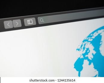 Close Up Of Blank URL Field In A Dark Theme Web Browser With A White Page Containing Only An Image Of The World In The Corner