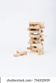 Close up blocks wood game (jenga) isolated on white background