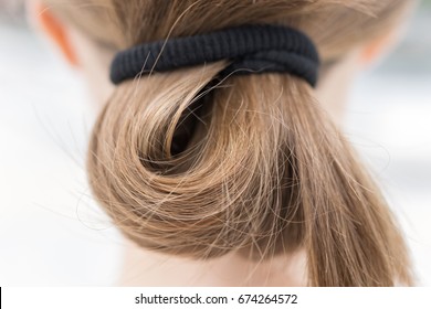 Close Up Of Blonde Casual Hair Bun In Pony Tail, Macro