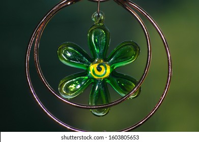 Close Up Of A Blown Glass Ornament Hanging In Window. Wind Chime 