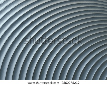 Close up of blue 3D curved panel. 3D curvy and arched pattern wall panel in blue color. Suitable for wallpaper, backdrop, and wall finish. Seamless background texture
