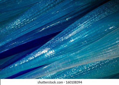 Close Up Of Blue Coloured Blown Glass Producing Interesting Textures And Colours.