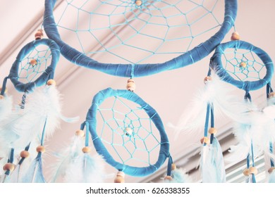 Close up blue Dream Catcher in the bedroom.