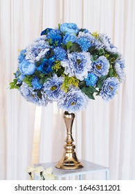 Close Up Blue Flower Bouquet On Golden Vintage Vase At The Wedding.