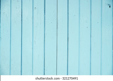 Close up blue green wooden door texture
