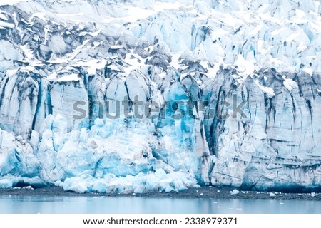Close up of the blue ice of the Lamplugh Glacier terminus in Glacier Bay National Park, Alaska