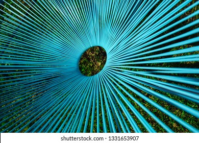 Close Up Of A Blue Plastic Cane Chair.