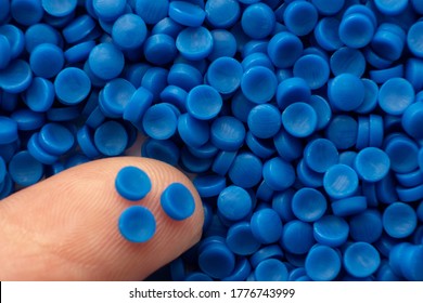 Close up of Blue plastic. plastic polymer granules, Raw materials for making water pipes, Plastics from petrochemicals and compound extrusion, resin from plant polyethylene.