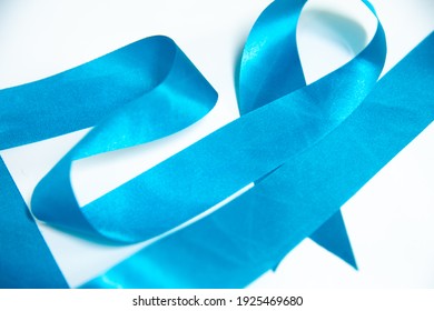 Close Up Blue Ribbon On White Background.