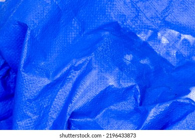 A Close Up Of Blue Tarp