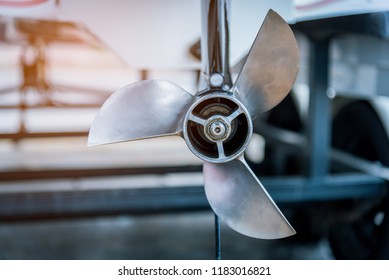 Close up Boat propeller of F1 speed board with sunlight rays