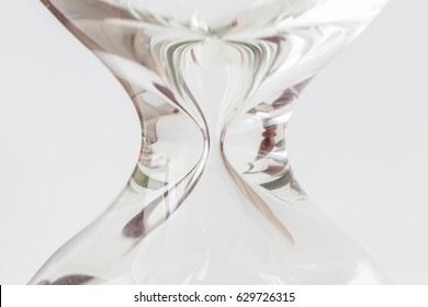 Close Up Body Shape Symmetry Of Hourglass Or Sandglass On White Background.