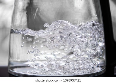 Close Up Boiling Water In Electric Kettle