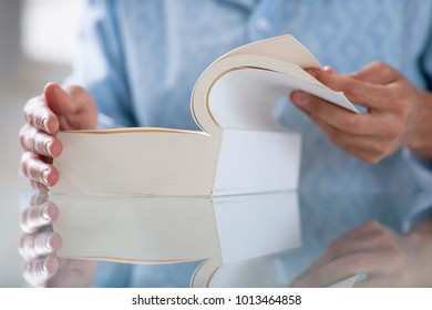 close up of a book being opened