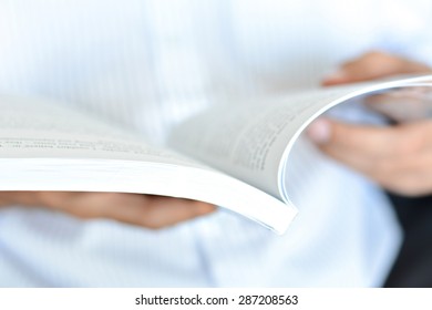 Close up of a book being opened