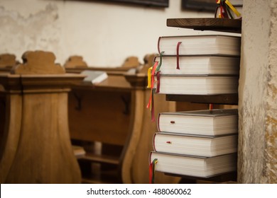 Close up of book stack in old church
